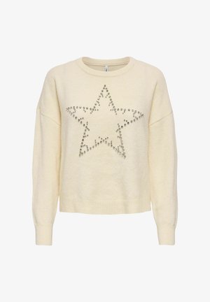 Maglione color crema con una vestibilità rilassata, caratterizzato da un grande motivo a stella realizzato con borchie argentate al centro. Morbido tessuto a maglia, polsini a costine.