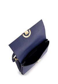 Navy leather shoulder bag with a textured finish, gold hardware, a flap closure, and a spacious interior featuring multiple compartments.
