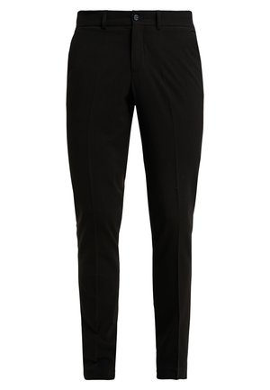 Pantalones negros de corte ajustado, hechos de una tela suave, con un frente plano, dos bolsillos laterales y un cierre de un solo botón.