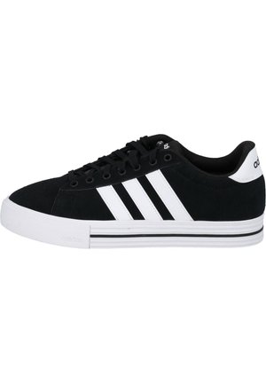 Czarne zamszowe trampki z białymi paskami, okrągły czubek, płaska biała podeszwa i czarne sznurówki. Posiadają logo adidas na pięcie.