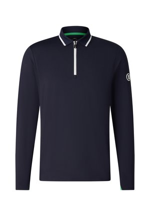 Polo à manches longues bleu marine avec une fermeture éclair blanche et un liseré au col, arborant un petit logo sur la manche gauche.