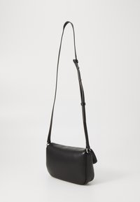 Tommy Jeans PILLOW FLAP CROSSOVER - Cross body bag - black