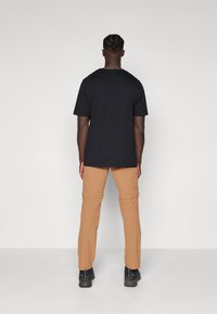 Mammut RUNBOLD ZIP OFF PANTS MEN - Hlače za na prostem - claystone