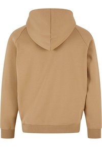 Beige hettegenser med snor i hetten, raglanermet, ribbede cuffs og nederkant. Glatt tekstur, enkel design uten grafiske elementer.