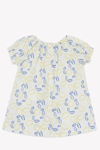 Short-sleeve blouse in light fabric with a yellow and blue leaf pattern. Features a button-down front and gathered neckline.