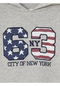 Gray hoodie featuring a large graphic with the numbers "63" and "3" in blue and red, accented with white stars and stripes, and "CITY OF NEW YORK" text.