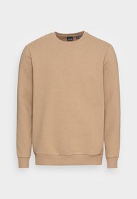 Sudadera beige hecha de una tela suave, con cuello redondo, puños y dobladillo acanalados, que presenta un diseño minimalista sin patrones ni acentos.