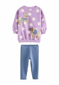 Sudadera morada con lunares blancos y aplicaciones de animales; combinada con leggings azules de canalé. Material suave, puños elásticos y dobladillo en forma de pico.