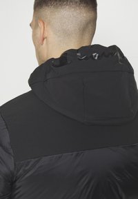Champion HOODED JACKET - Spordijakk - black