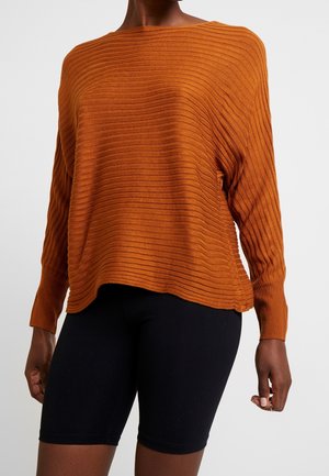 Stickad tröja - cognac
