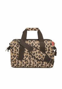 Bolsa de viaje con estampado de leopardo en tonos marrón y beige, con asas dobles y una correa de hombro removible y ajustable. Cierre con cremallera. Material duradero.