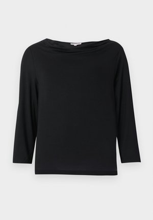 Must have pikkade varrukatega must särk, mis on valmistatud pehmest kangast. Omab laia kaelust ja vabalt langevat lõiget, sirge äärega ning ilma nähtavate mustrite või detailideta.