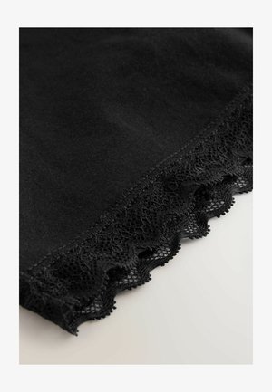 Mustad kangas, mille alumine äär on kaunistatud soonikuga ning millel on peene võrkmustriga ja õrnad lillemotiivid.