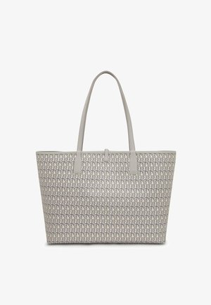 Szara torba typu tote z długimi uchwytami, charakteryzująca się teksturowaną powierzchnią i usztywnionym, prostokątnym kształtem. Wyróżniające się elementy w zygzakowaty wzór.