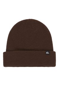 Brown knit beanie with a folded cuff, featuring a small black and white logo tag on the side. Textured fabric with a close-knit pattern.