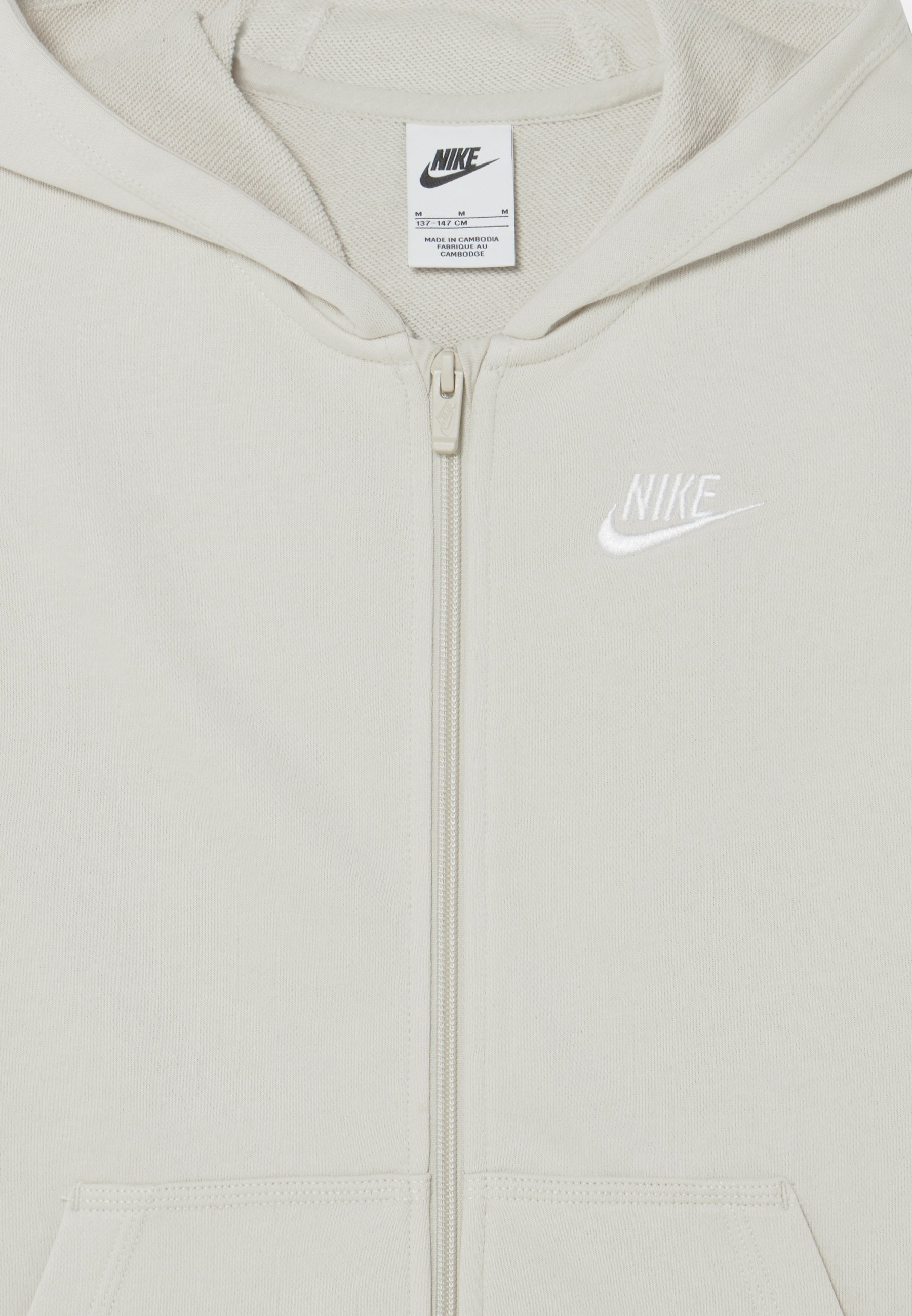 grey nike tracksuit zip up