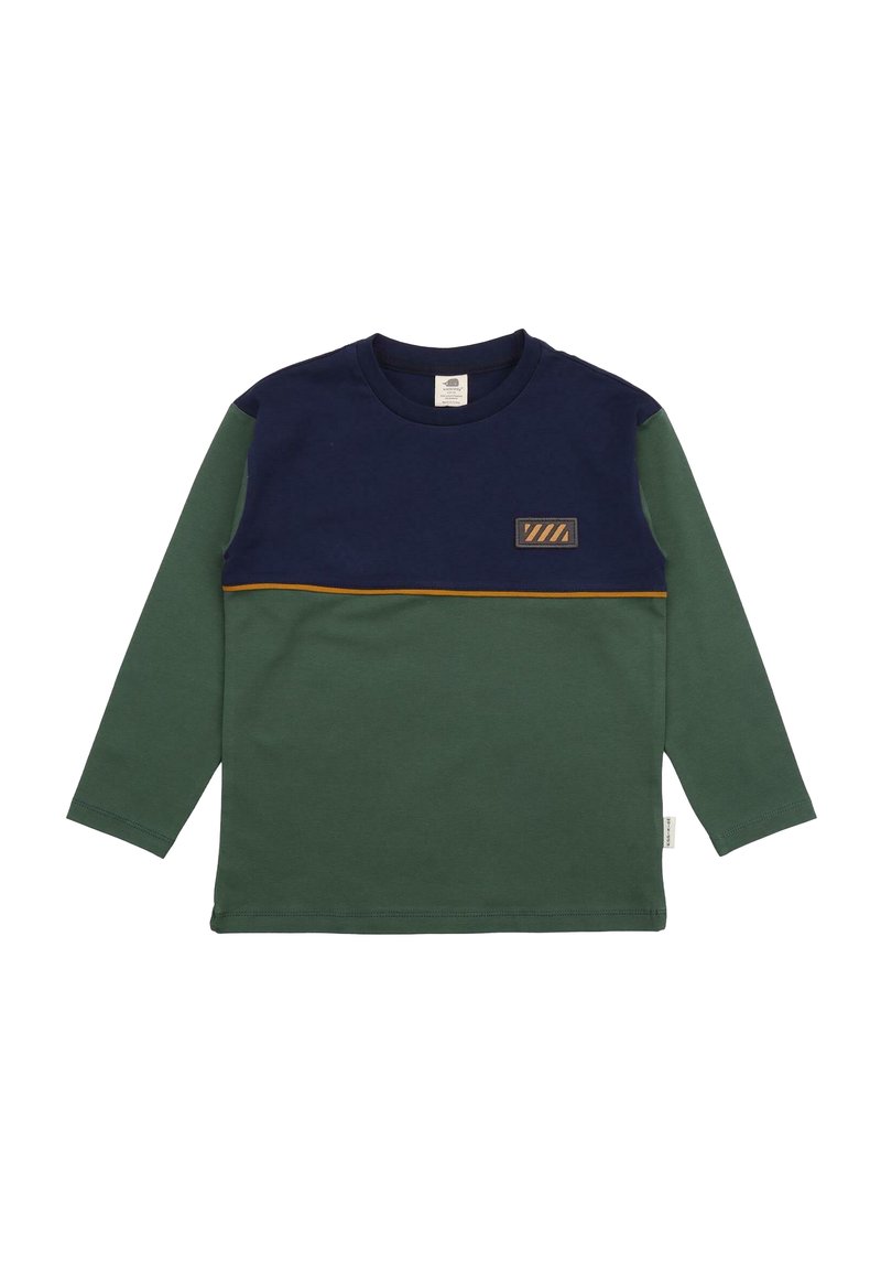 Long-sleeve t-shirt in dark green and navy, featuring a horizontal tan stripe and a patch. Made from soft fabric with a crew neck.