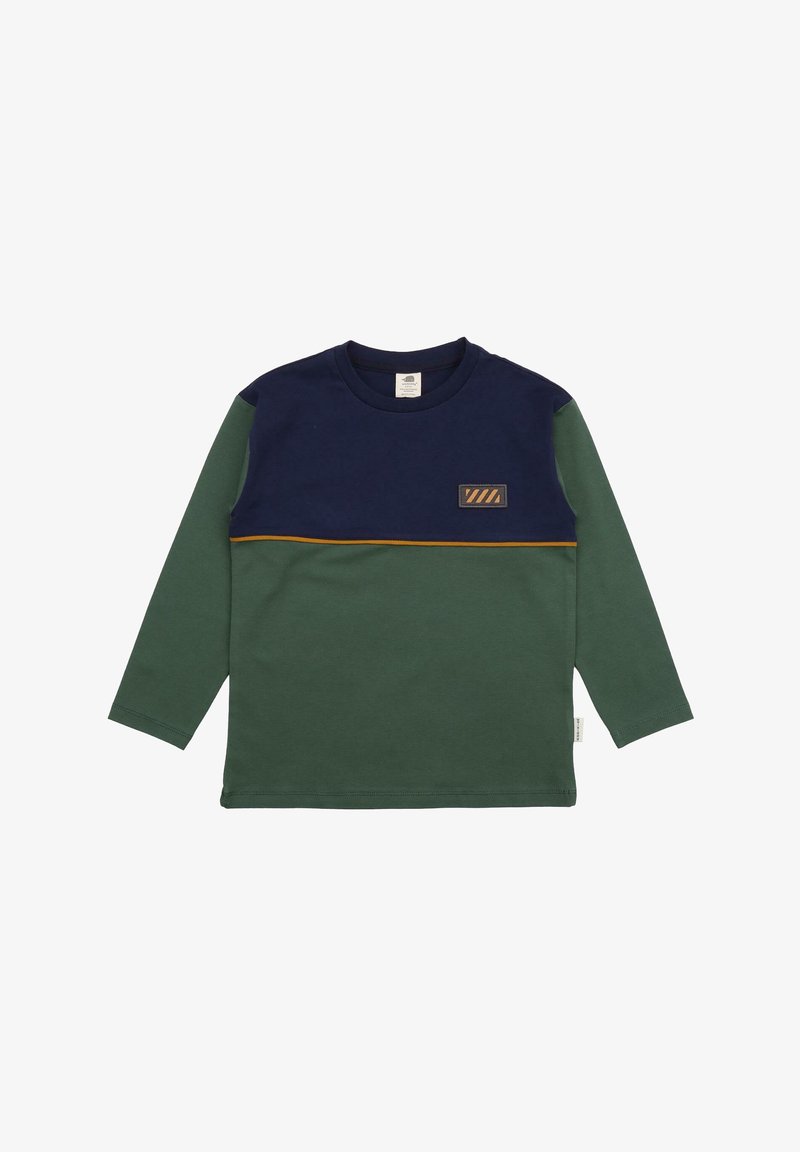 Long-sleeve t-shirt in dark green and navy, featuring a horizontal tan stripe and a patch. Made from soft fabric with a crew neck.