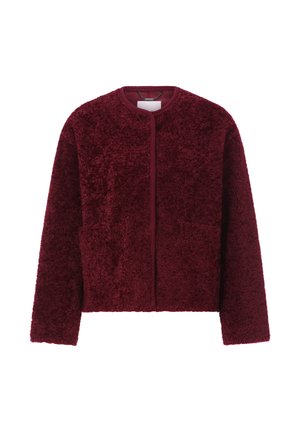 Veste en velours bordeaux avec un col rond et des poches avant, présentant un design simple à fermeture ouverte. Convient pour un style décontracté.