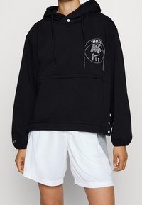 Nike Performance Jersey con capucha - black