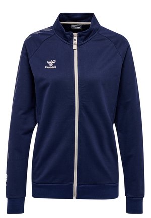 Marine blauwe zip-up jack gemaakt van een gladde stof, voorzien van een hoge kraag, lange mouwen en een wit logo op de borst, evenals een geprint accent op de mouwen.