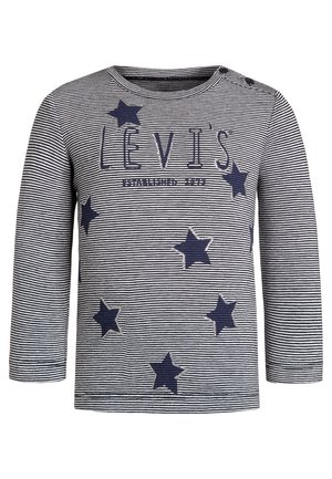 T-shirt bébé à manches longues avec fines rayures noires et blanches, étoiles bleu marine et texte "LEVI'S" sur la poitrine, fermeture à boutons à l'épaule.