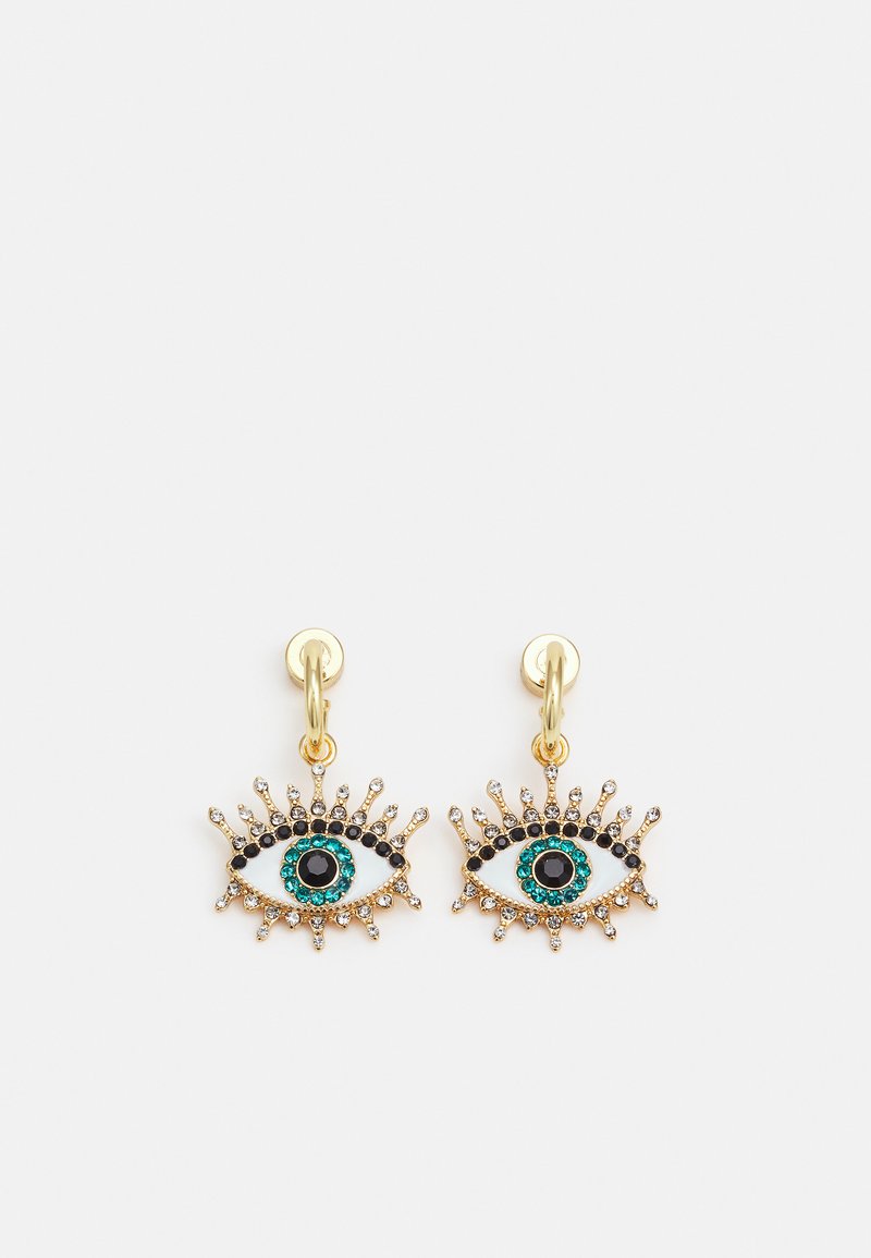 Gold earrings featuring an eye design, embellished with black, turquoise, and clear rhinestones, with spikes radiating from the edges.