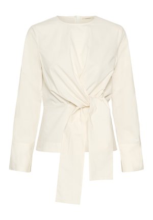 Witte blouse met lange mouwen, voorzien van een knoopdetail aan de voorkant met een gestrikte accent, gemaakt van gladde stof met een ronde halslijn en knoopsluiting.