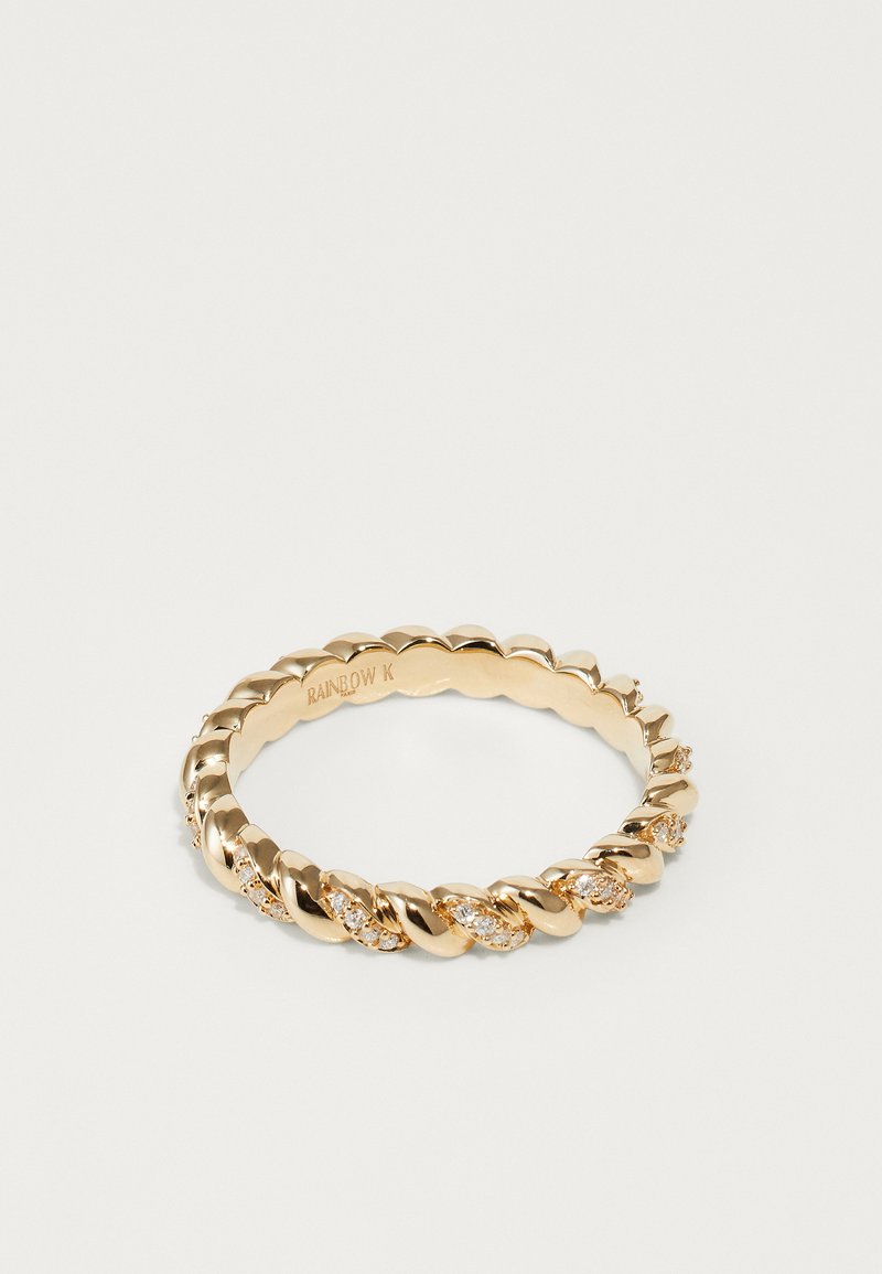 Gold twisted band ring featuring clear gems embedded along the design, showcasing a smooth, polished finish and a rounded shape.
