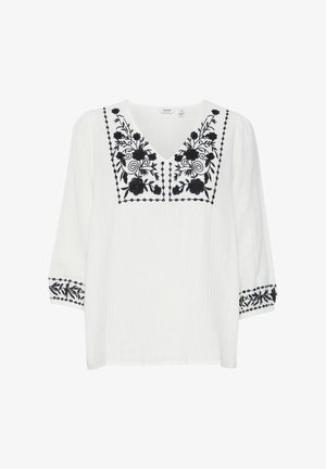 Vit blus med svart blommönster broderat på halsringningen och ärmarna, med V-ringning och trekvartsärmar.