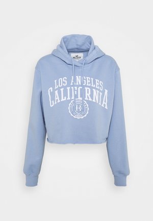 Felpa corta color azzurro chiaro con la scritta "LOS ANGELES CALIFORNIA" e il logo Hollister sul davanti, caratterizzata da maniche lunghe e cappuccio con coulisse.