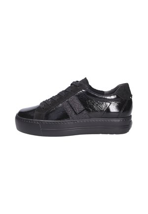 Black low-top sneaker with mixed shiny and matte textures, lace-up front, and thick rubber sole, shown from the side.
