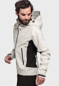 Light gray waterproof jacket featuring a zippered front, black accents, adjustable hood, and side pockets; smooth texture and modern design.