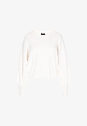 Lühendatud valge kudumiskampsun ümmarguse kaelusega, pallikujuliste varrukatega ja sooniku äärtega. Pehme tekstuur, minimalistlik disain, ilma mustrite või aktsentideta.