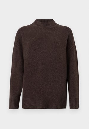 Brown pullover sweater with a high ribbed neck, dropped shoulders, and ribbed hem. Soft texture, relaxed fit, and seamless design.