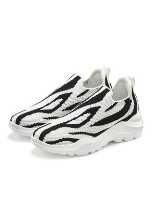 Pair of slip-on athletic shoes with black and white knitted fabric and thick white textured soles, shown at slight angle on white background.