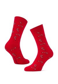 Czerwone bawełniane skarpetki w wzór cukrowej laski, z gładką fakturą i klasycznym wykończeniem. Idealne na świąteczne okazje.