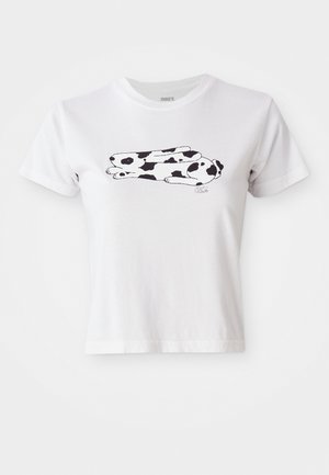 Maglietta in cotone bianco con grafica di un coniglio cartone animato in bianco e nero, maniche corte e scollo rotondo.