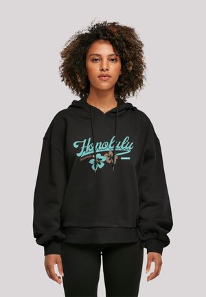 Black hooded sweatshirt featuring a turquoise "Honolulu" graphic and floral accents in brown and teal, with wide sleeves and a relaxed fit.