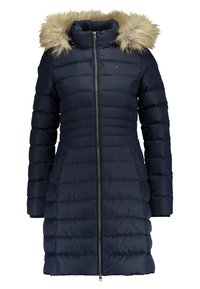 Navy blue puffer coat with a faux fur hood, zip closure, side pockets, quilted design, and long sleeves. Soft texture and insulated body.