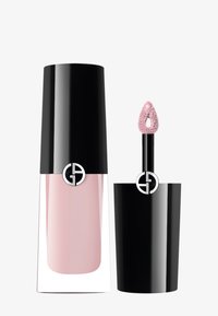 Vernis à ongles dans un flacon en verre transparent avec un capuchon noir. Présente une teinte rose. Accompagné d'un applicateur noir avec une pointe rose texturée.