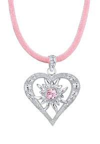 Pendentif en argent en forme de cœur avec des découpes complexes et un centre en pierre précieuse rose, suspendu à un collier en cordon rose.