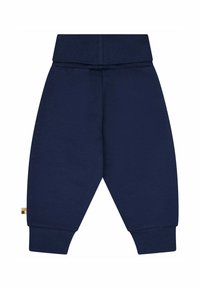 Marineblauwe katoenen joggers met een brede tailleband, elastische boorden en een klein meerkleurig label aan de zijkant. Soepele textuur; losse pasvorm.