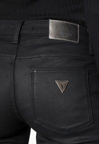 Guess SEXY BOOT - Calças de ganga bootcut - planet luxe