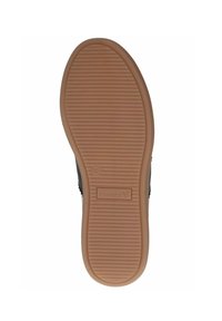 Černá podrážka boty s texturovaným žebrovaným designem. Béžová gumová podrážka s malým logem a označením velikosti, s kulatým tvarem a flexibilními drážkami.