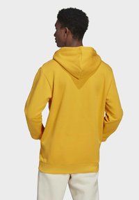 adidas Originals TREFOIL - Kapucnis pulóver - yellow