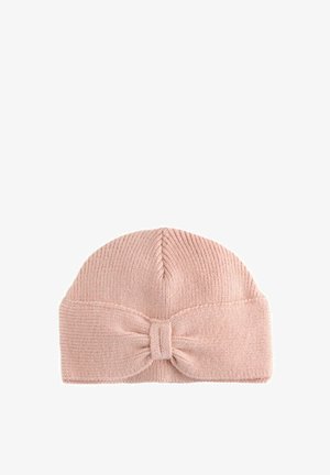 Rosa Strickmütze mit abgerundetem Oberteil und einem breiten, strukturierten Rand, der vorne mit einer Schleife verziert ist. Weiches Material mit einem gerippten Muster.