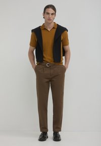 Calliope Poloshirt - jaune