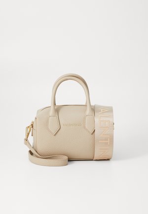Beige leather handbag with two top handles, adjustable strap, and embossed logo. Features a textured surface and flat shape.