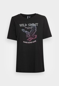 Svart bomullströja med korta ärmar, med en grafisk design av en örn och texten "WILD SPIRIT ROCK AND ROLL WORLD TOUR MAKE SOME NOISE."